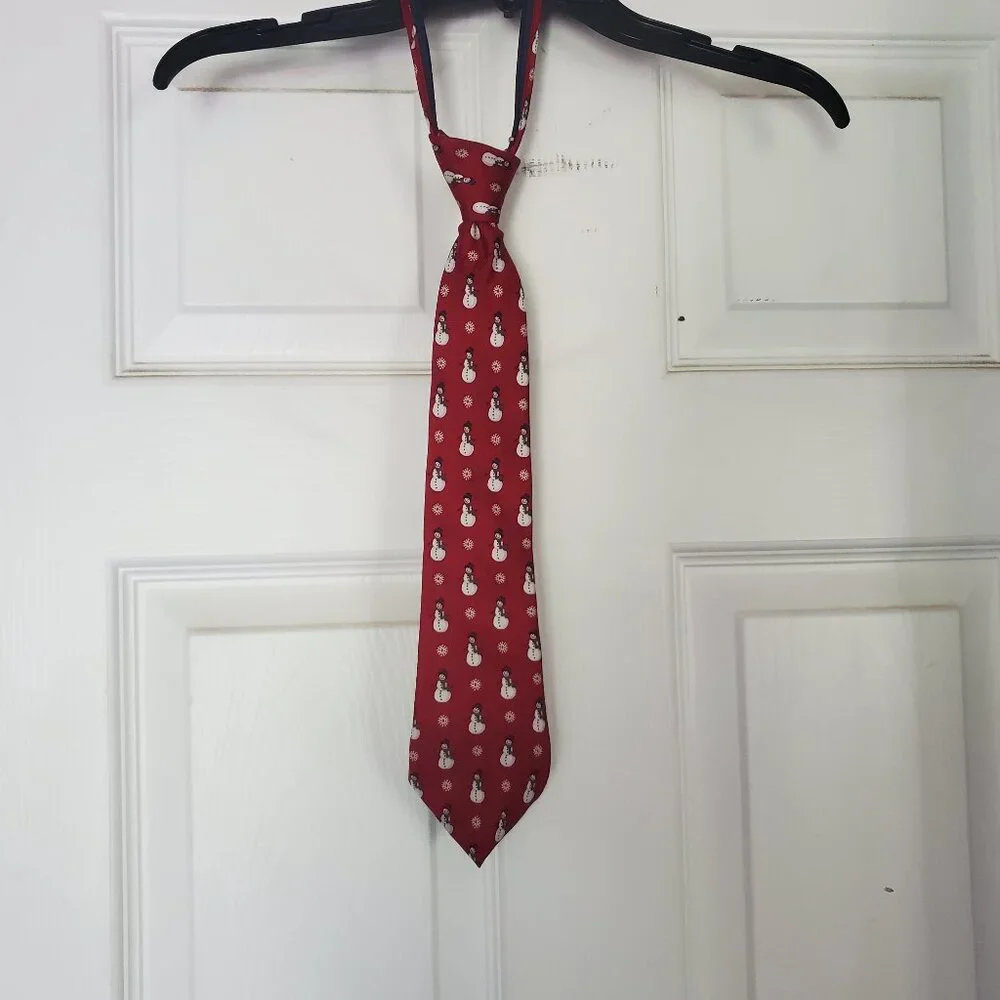 Kids adjustable zip neck tie. Red/Snowmen pattern.